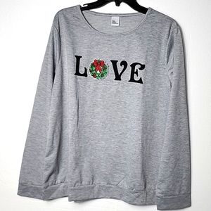 Woman's long sleeve with Holiday interchangeable Season patches. New No Tags.